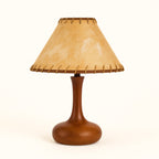 Vintage Style Brown Wood Table Lamp with Tapered Stem and Stitched Suede Shade