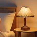 Vintage Style Brown Wood Table Lamp with Tapered Stem and Stitched Suede Shade